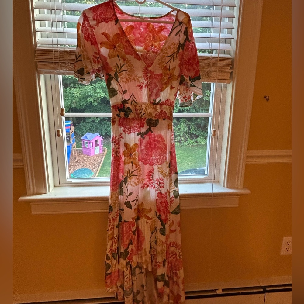 Floral, brightly colored light full lengthy dress.